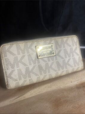 Michael Kors Cream Logo Zip-Around Wallet with Gold Plate